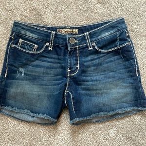 BKE Madison Jean shorts with white stitching.